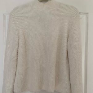 White fuzzy winter sweater